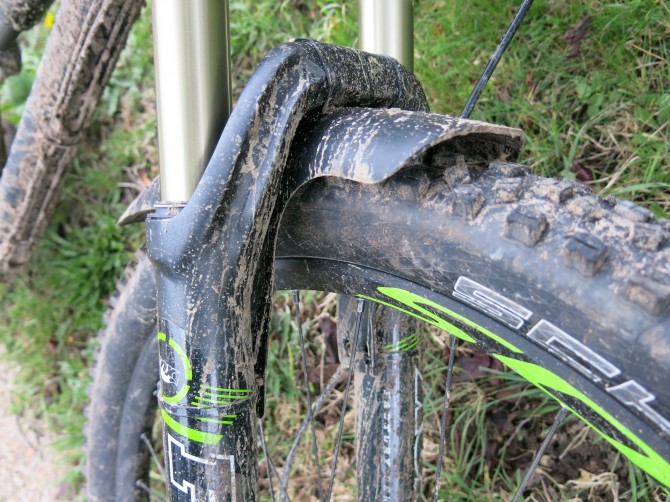 By curving around the tyre you get far more protection.