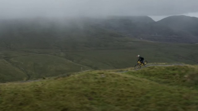 Elliott Heap styles down Antur Stiniog Bike Park on his Trail Bike