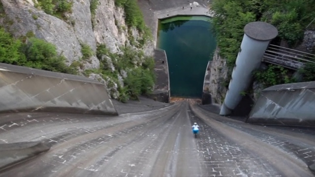 Biker Films Insane 60m Bike Dam Drop In Slovenia