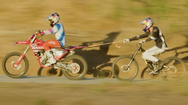 Video: Dirtbike tow in to FMX jumps on Mountain Bike with Jaxson Riddle