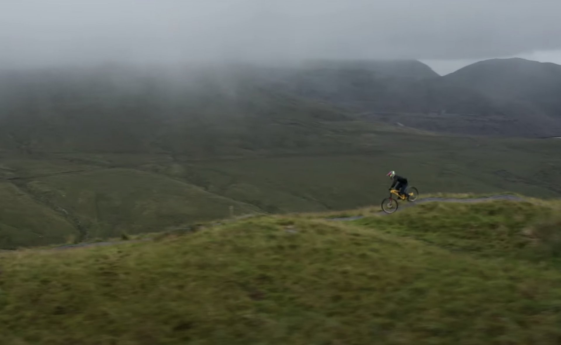 Elliott Heap styles down Antur Stiniog Bike Park on his Trail Bike